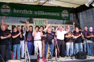 2004 wirkte der Chor beim Empfang von Dr. Markus Merk mit, der das Endspiel der Europameisterschaft leiten durfte.
